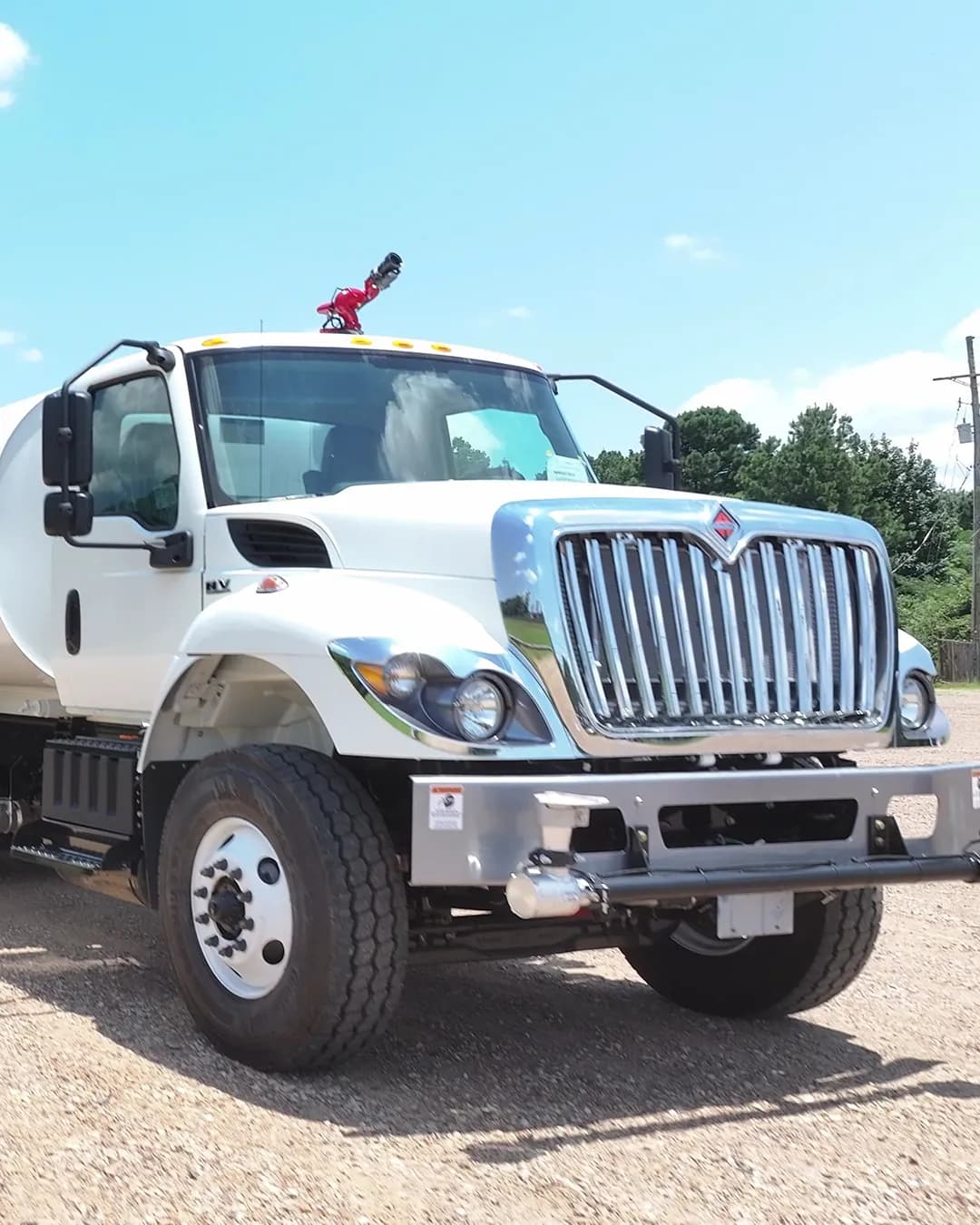 White International HV water truck with a Ledwell 4,000 gallon tank and water cannon