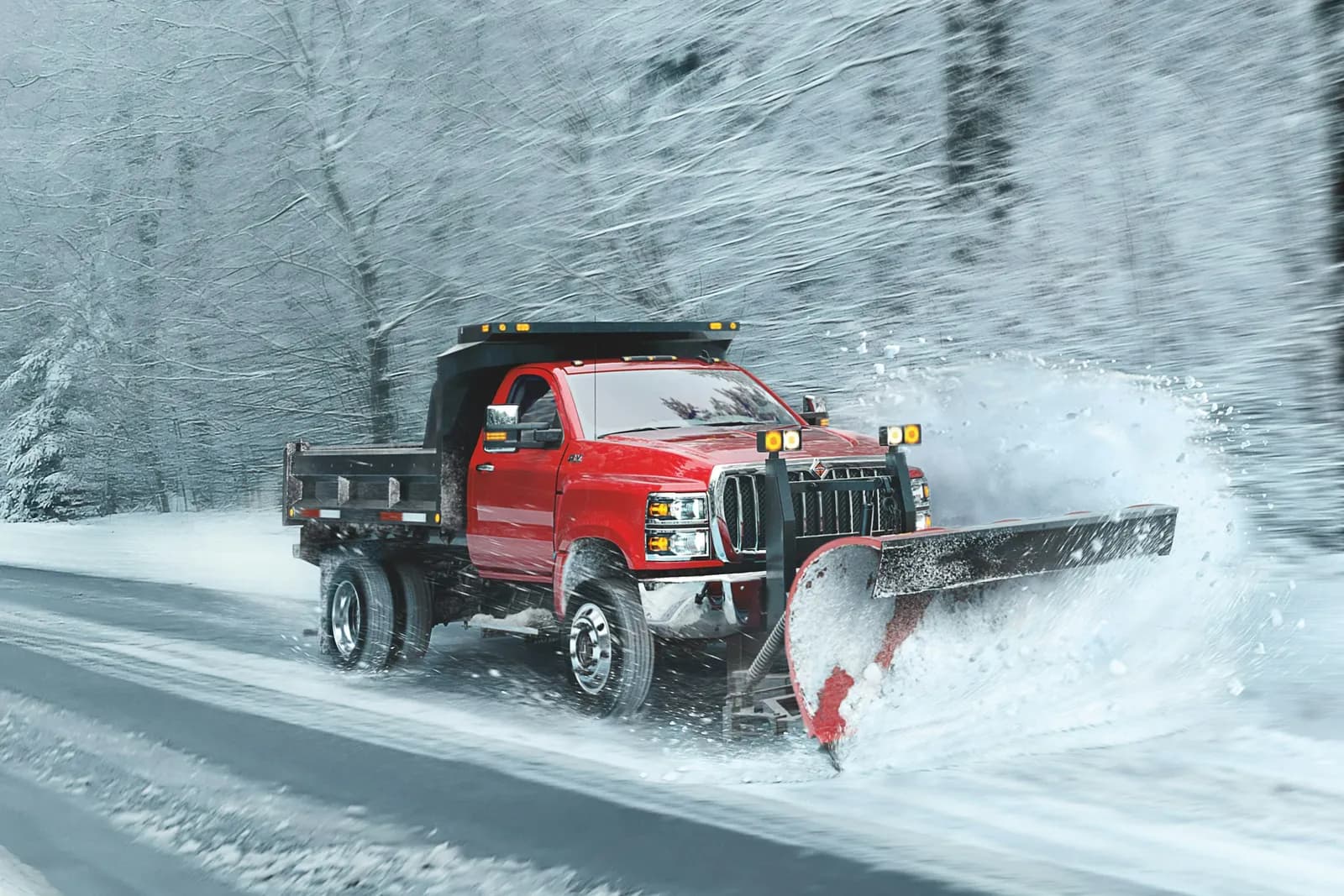 International CV Series truck fitted with a snow plow clearing a street