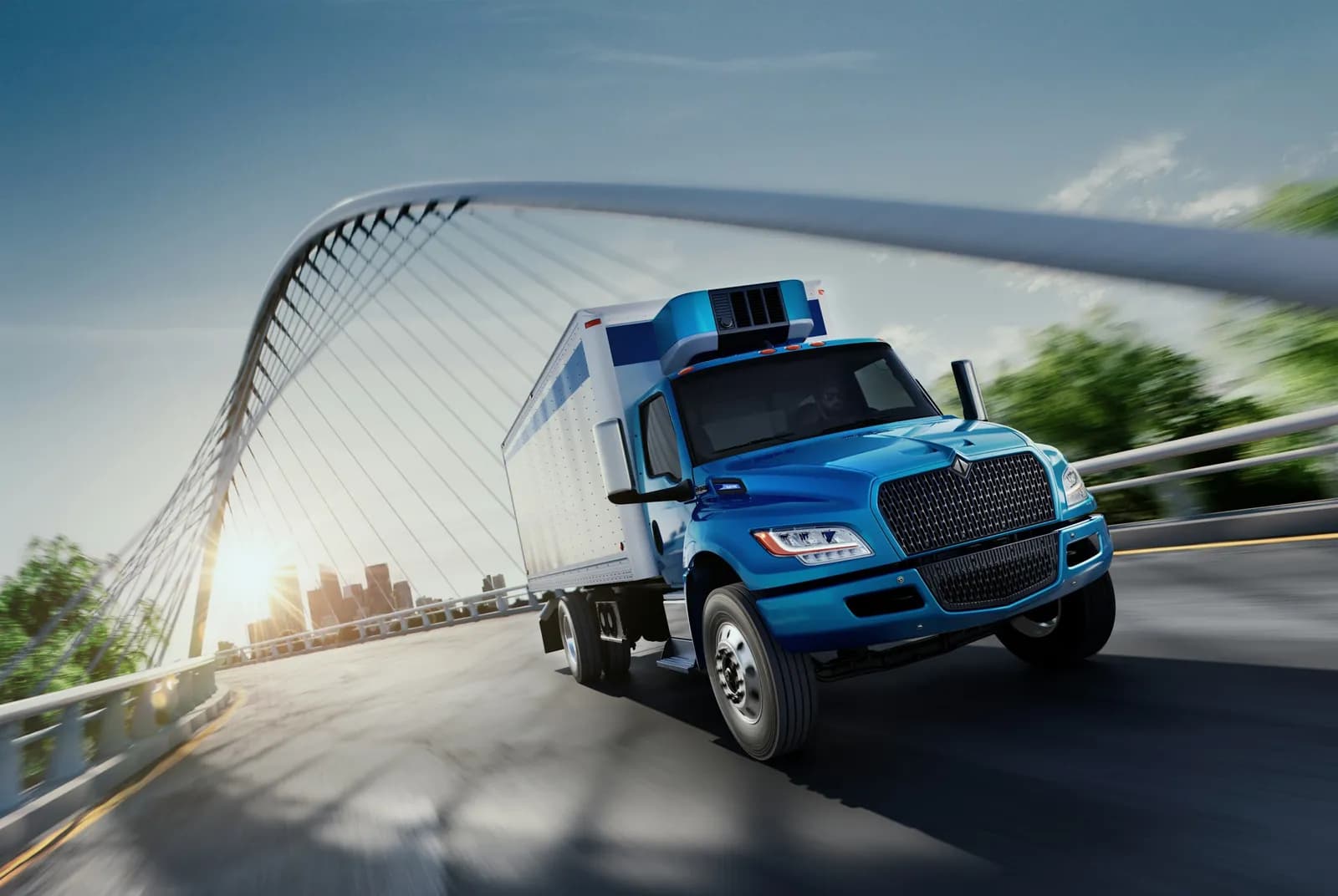 International eMV Series refrigerated truck crossing a bridge