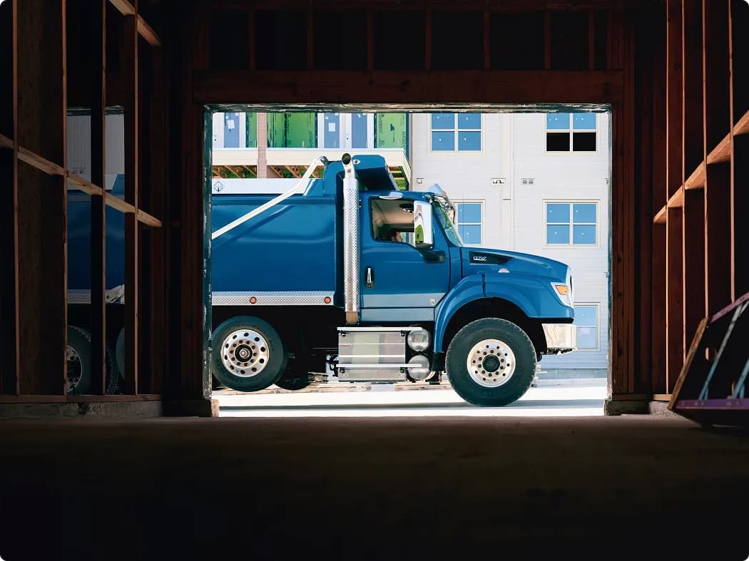 Blue International HV Series truck at a construction site