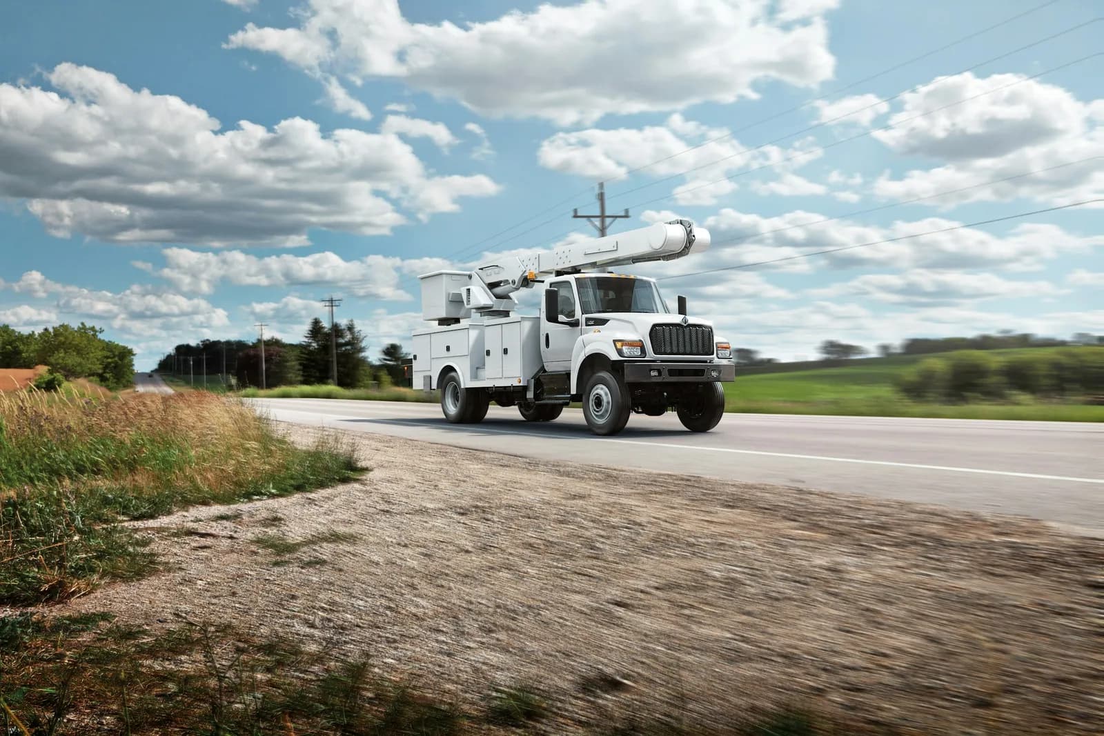 International HV Series utility truck on a road