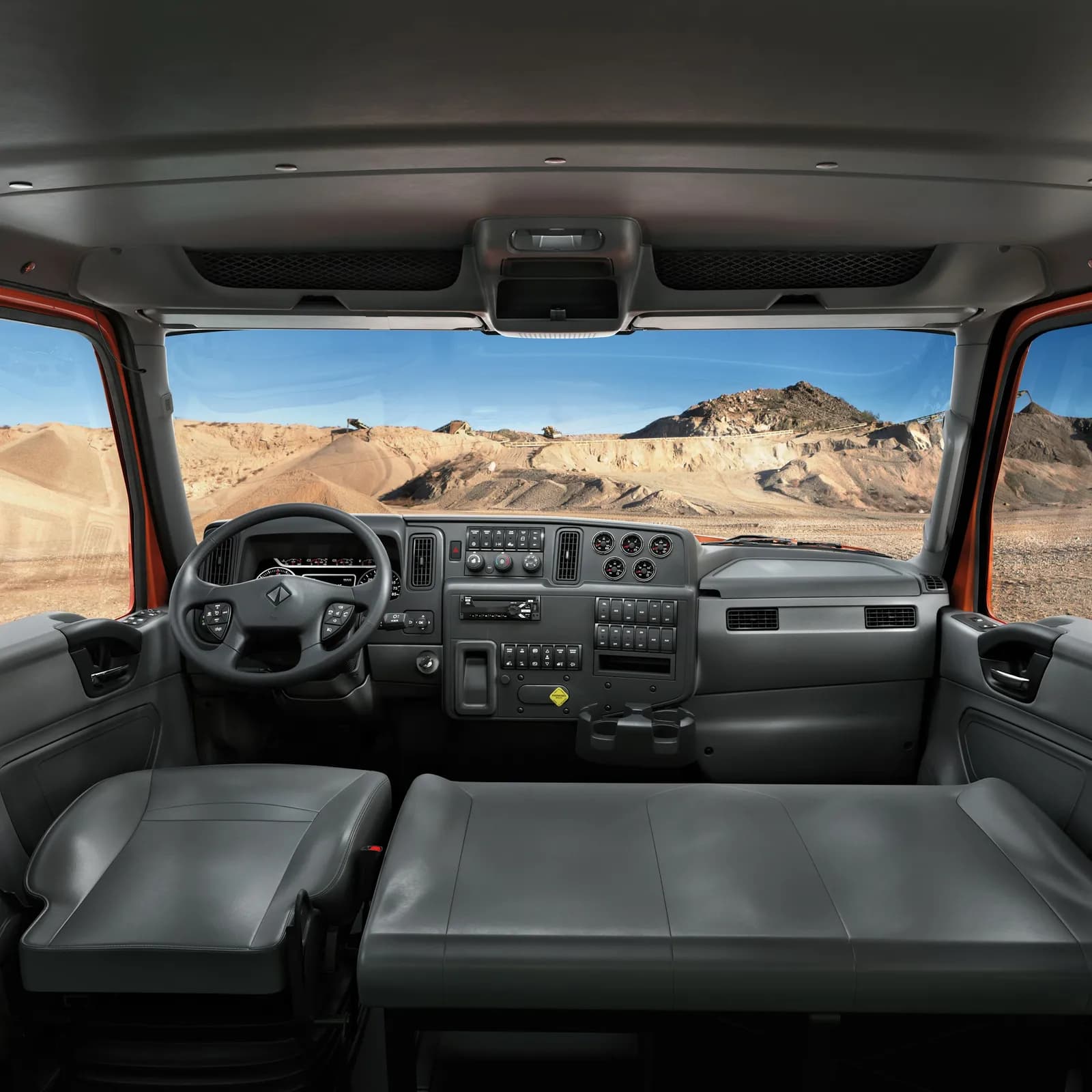 International HV Series interior and dashboard with stalk shifter and premium gauge cluster