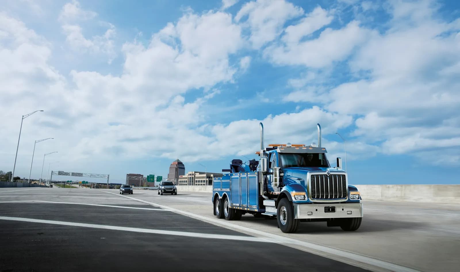 Blue International HX Series heavy wrecker recovery truck