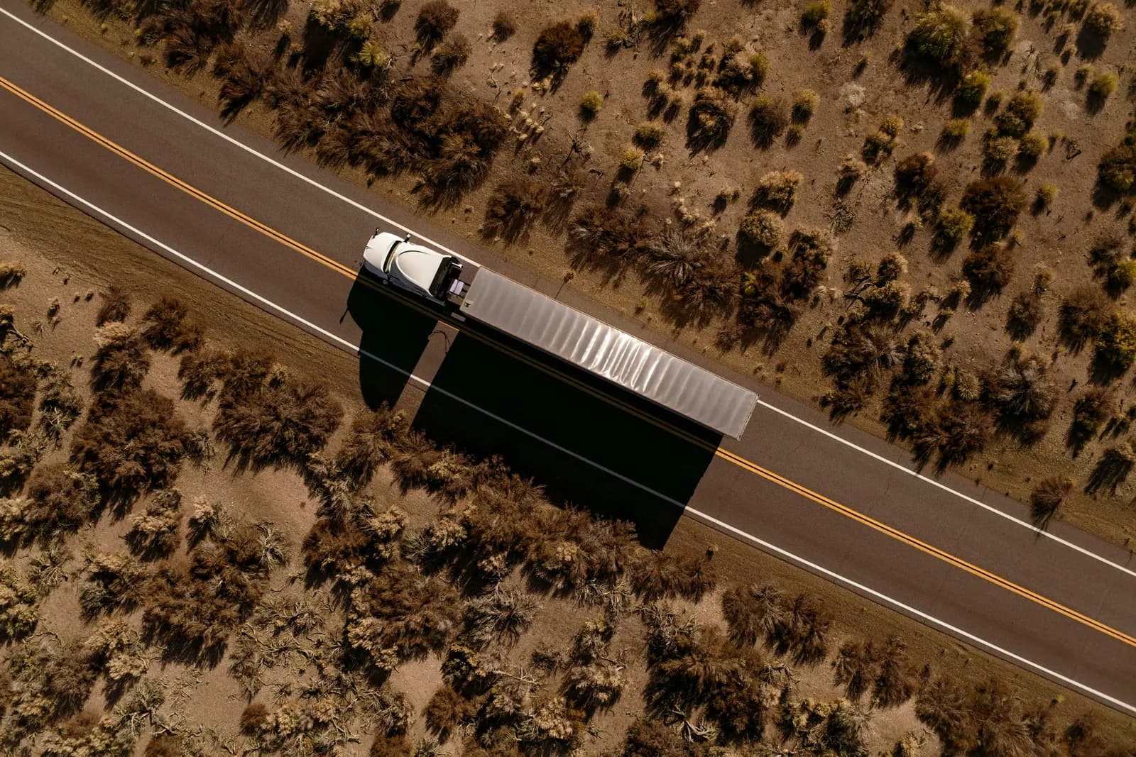 Aerial view of an International LT Series tractor pulling a dry van