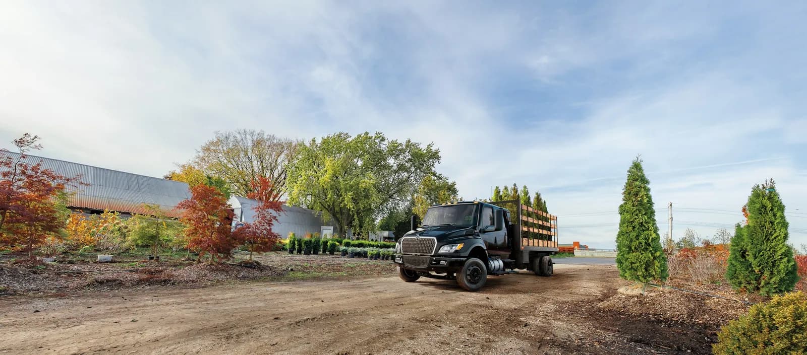 MV Series landscape truck on a dirt road